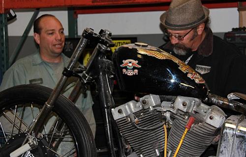 Ron Harris, being question by Bob Kay, Bikernet investigator, during Detroit shops tour.