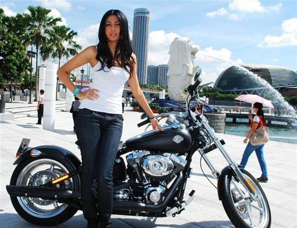 Marilyn with Chris Brixi's Rocker C Screamin' Eagle at the Merlion Statue in Fullerton Park.