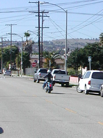 riding down the road