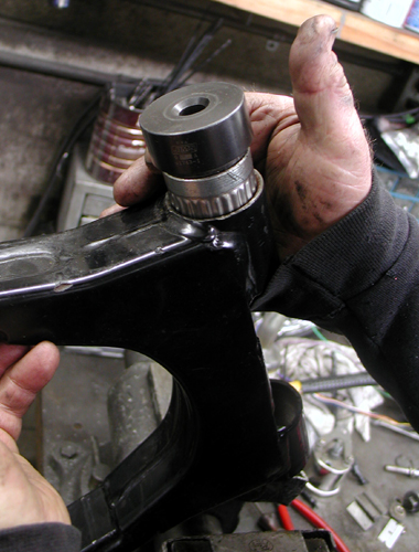 swing arm roller bears
