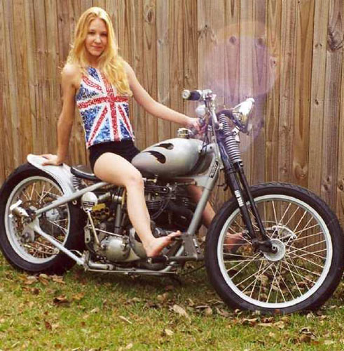 blonde in rw&b sitting on bike