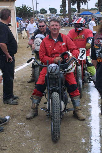 facing guy sit on race bike