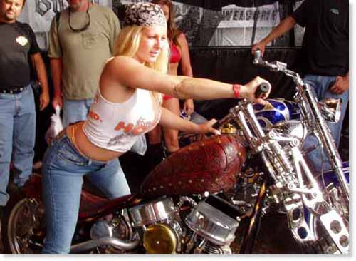 hooters girl on leather bike