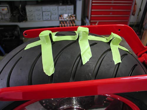 26 fender spacers taped to tire