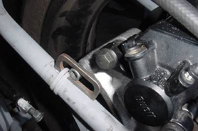 BRAKE 
ANCHOR TIE-WRAPPED TO FRAME
